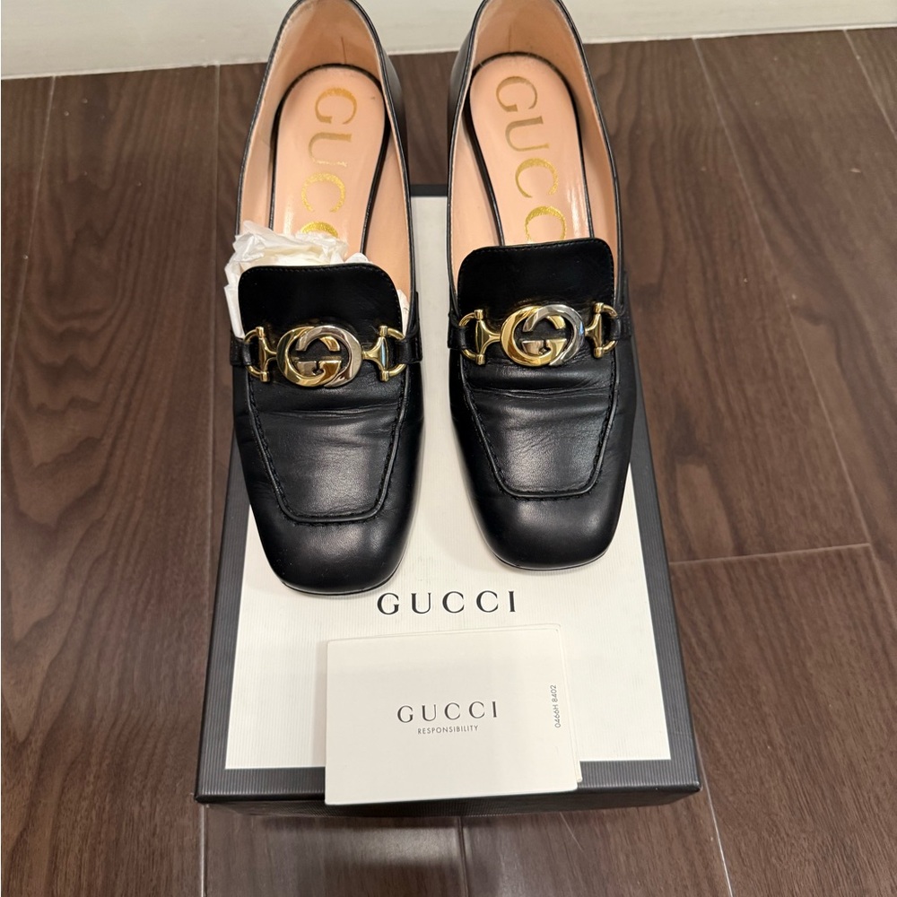 Gucci Black Leather Loafers with Gold Accent